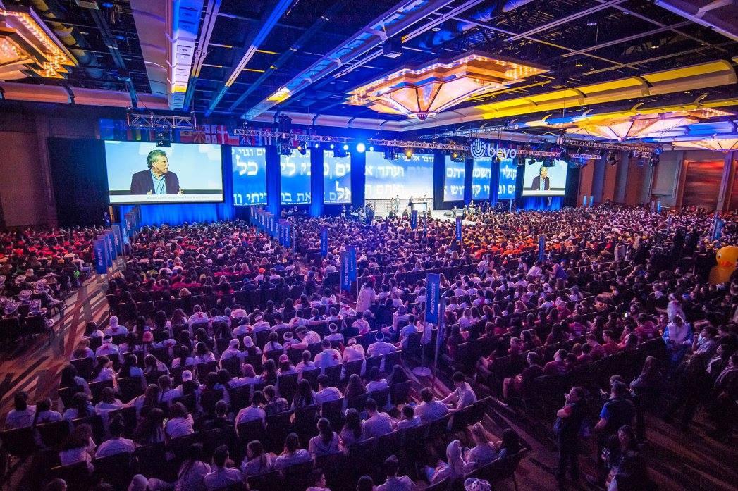 Group of people celebrating on stage