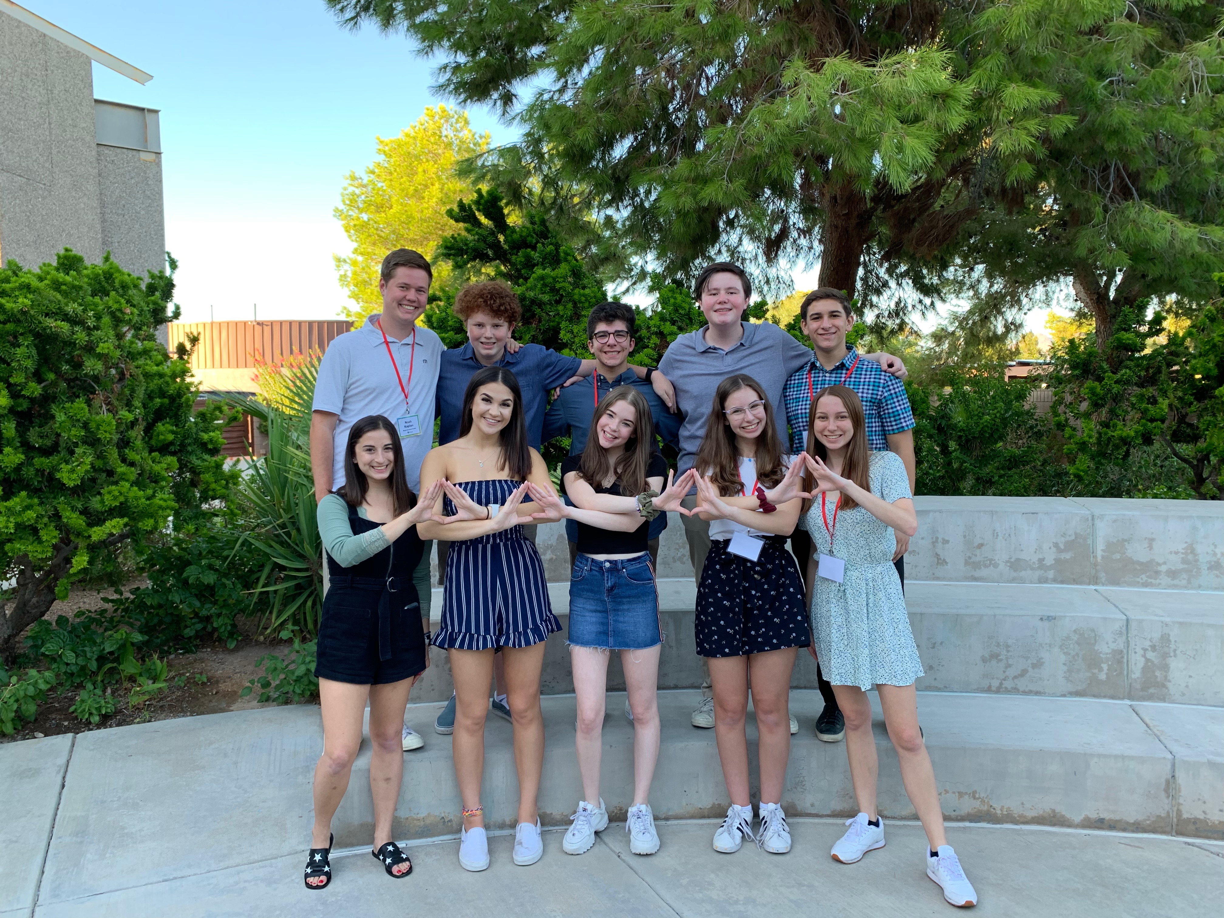 Group of people celebrating on stage