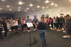 Group of people celebrating on stage