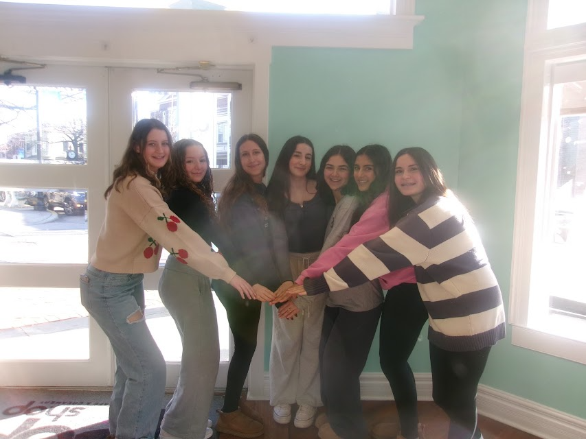 Group of people celebrating on stage