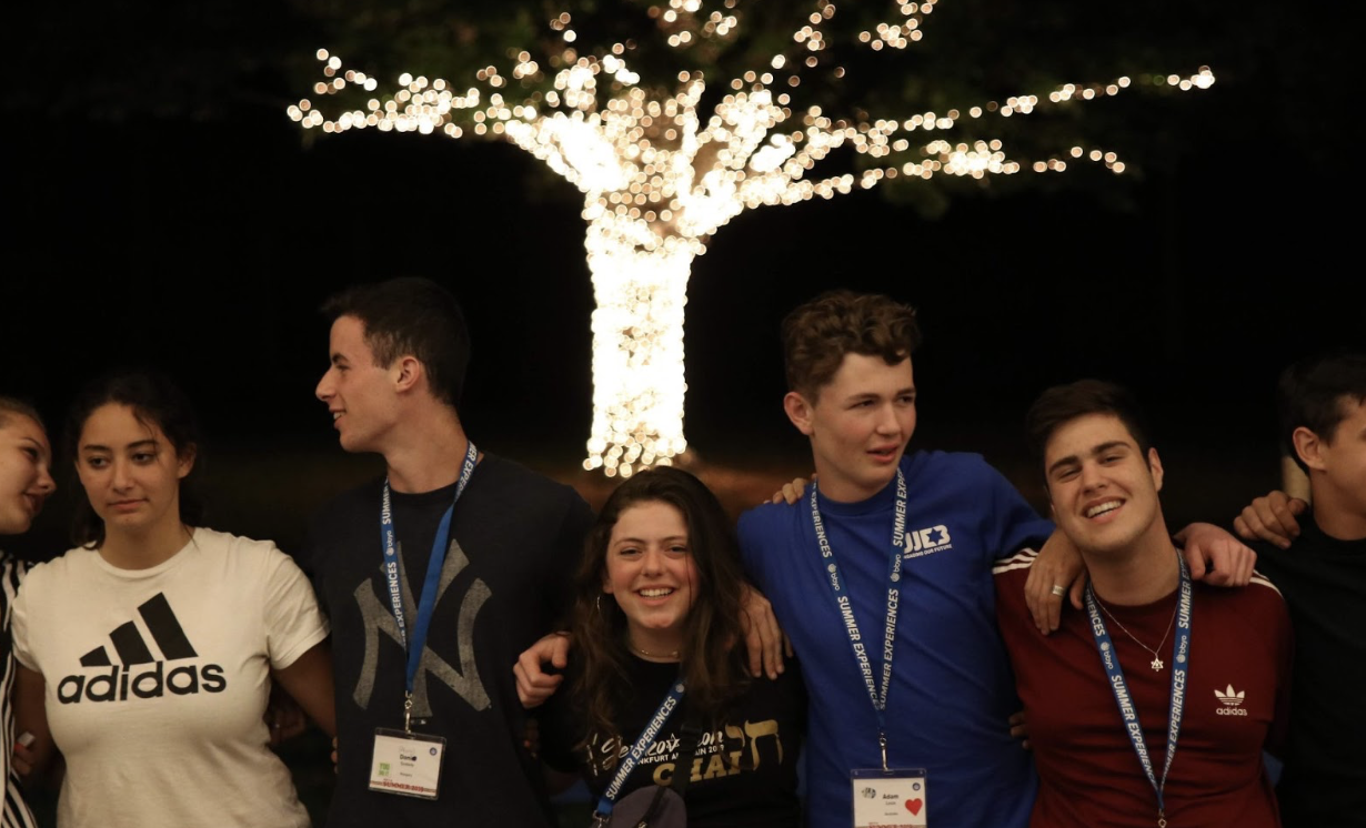 Group of people celebrating on stage
