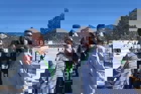 Group of people celebrating on stage