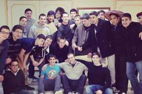 Group of people celebrating on stage