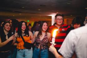 Group of people celebrating on stage