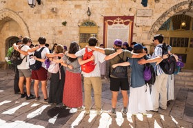 Group of people celebrating on stage