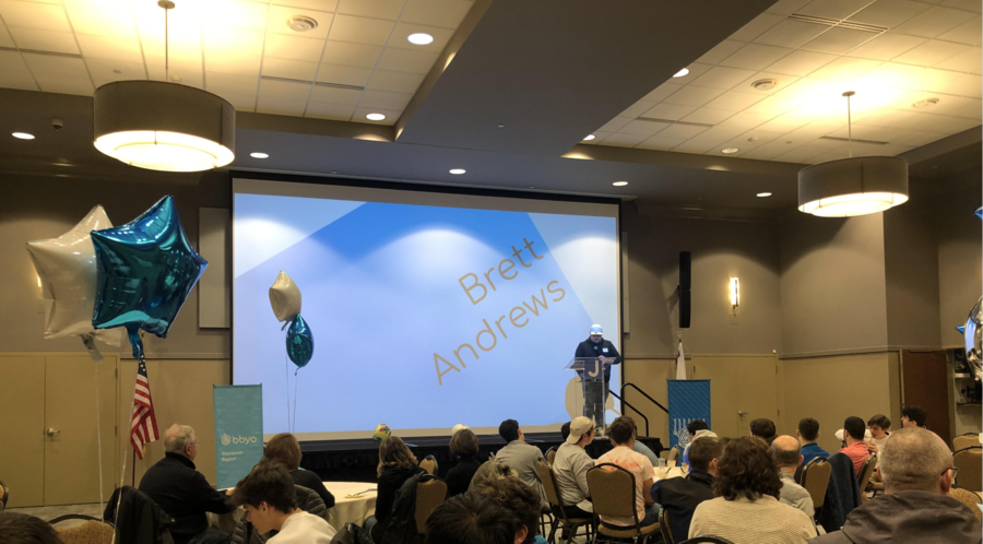 Group of people celebrating on stage