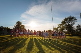 Group of people celebrating on stage