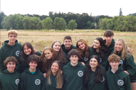 Group of people celebrating on stage