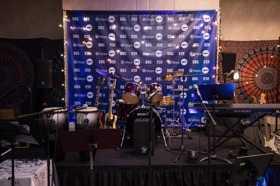 Group of people celebrating on stage