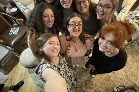 Group of people celebrating on stage