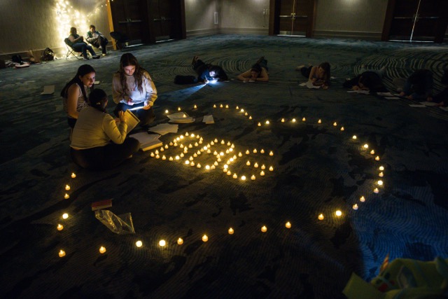 Group of people celebrating on stage