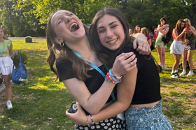 Group of people celebrating on stage