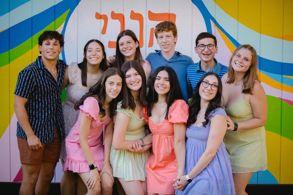 Group of people celebrating on stage