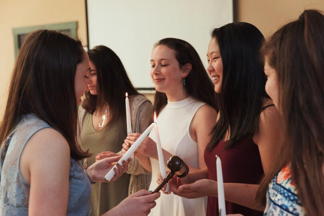 Group of people celebrating on stage