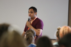 Group of people celebrating on stage