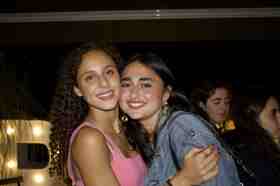 Group of people celebrating on stage