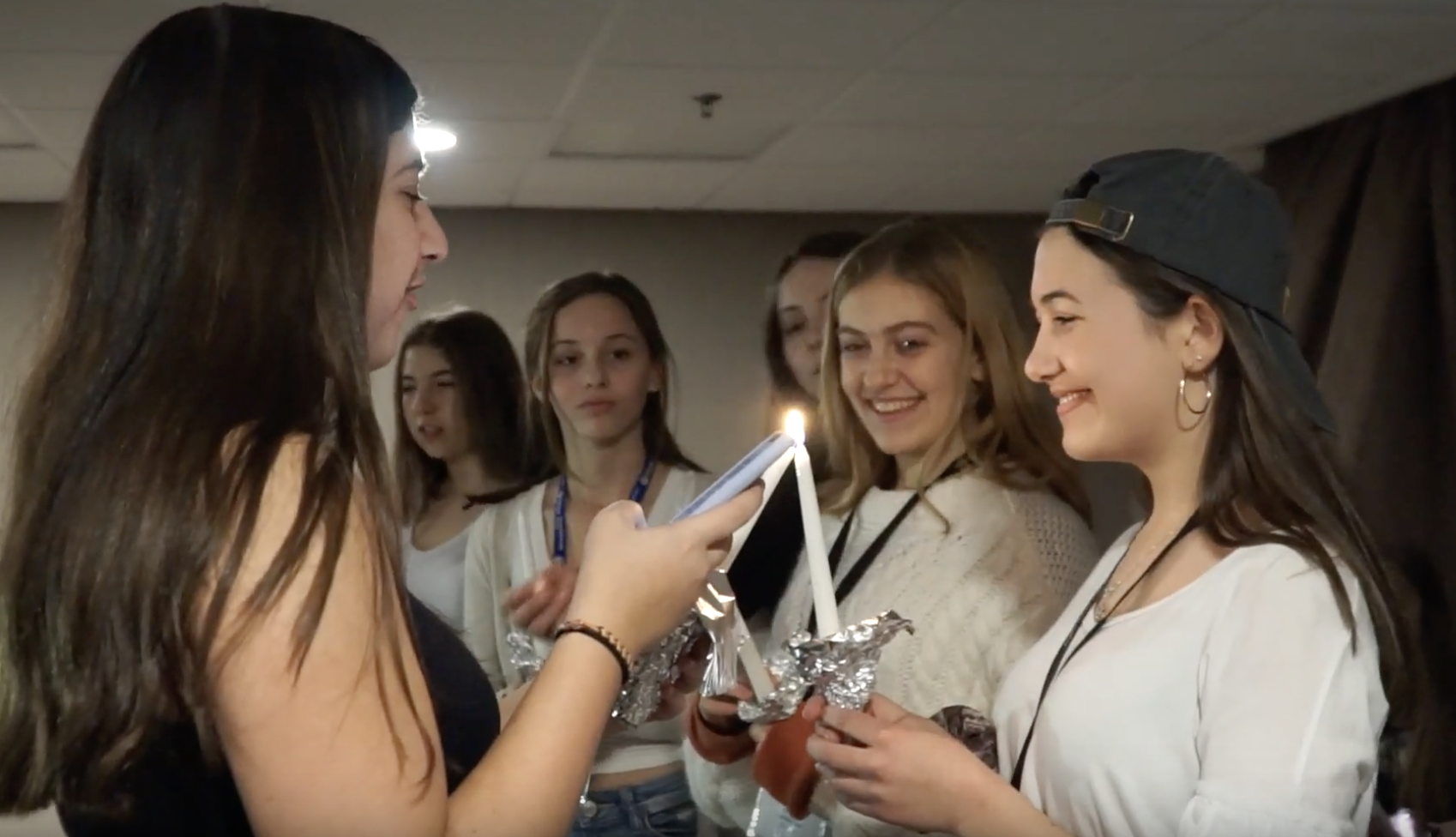 Group of people celebrating on stage