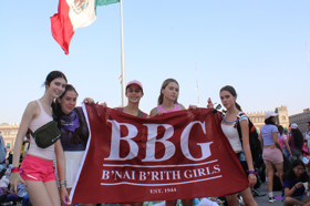 Group of people celebrating on stage