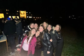 Group of people celebrating on stage