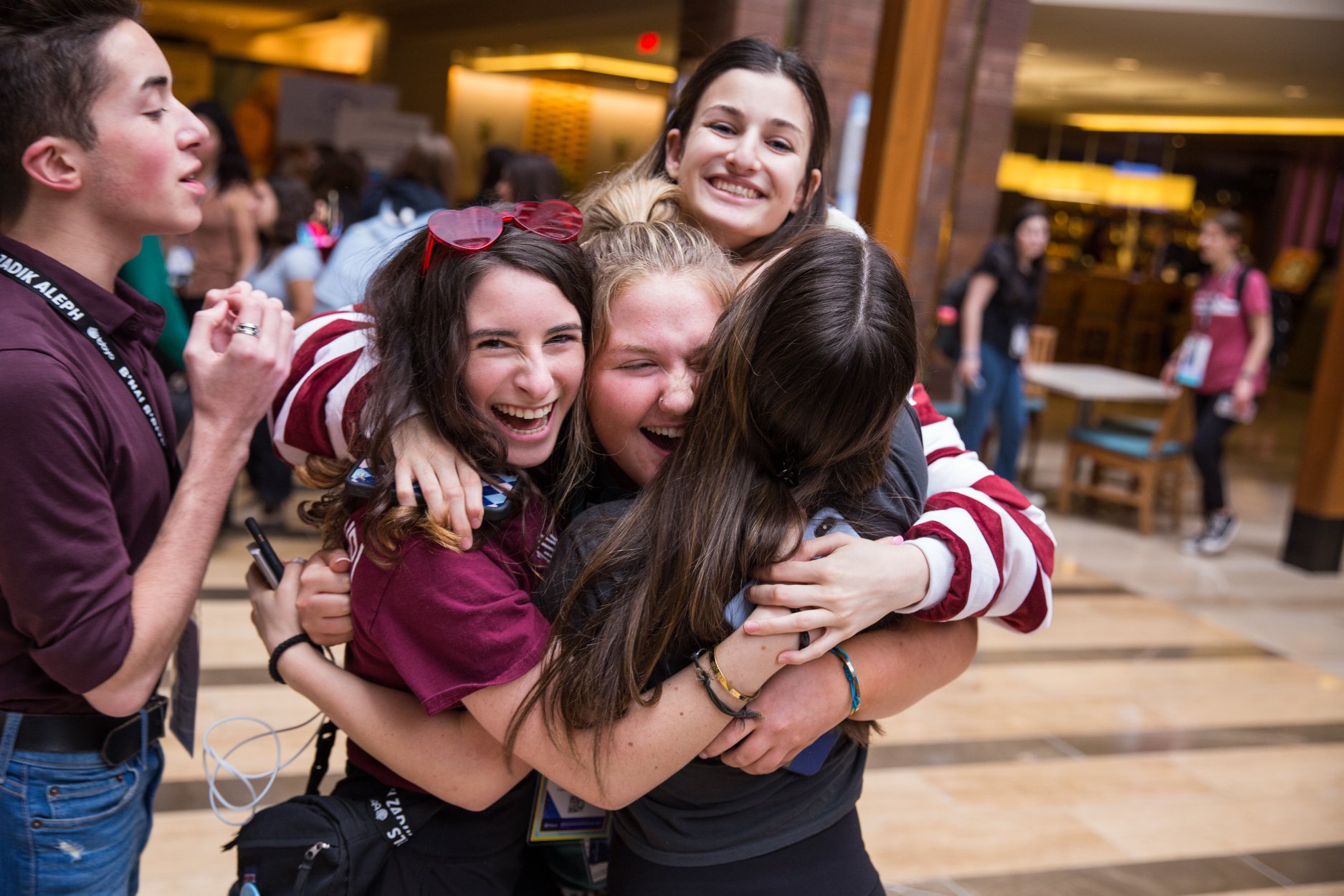 Group of people celebrating on stage