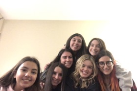 Group of people celebrating on stage