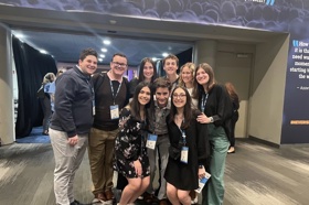 Group of people celebrating on stage