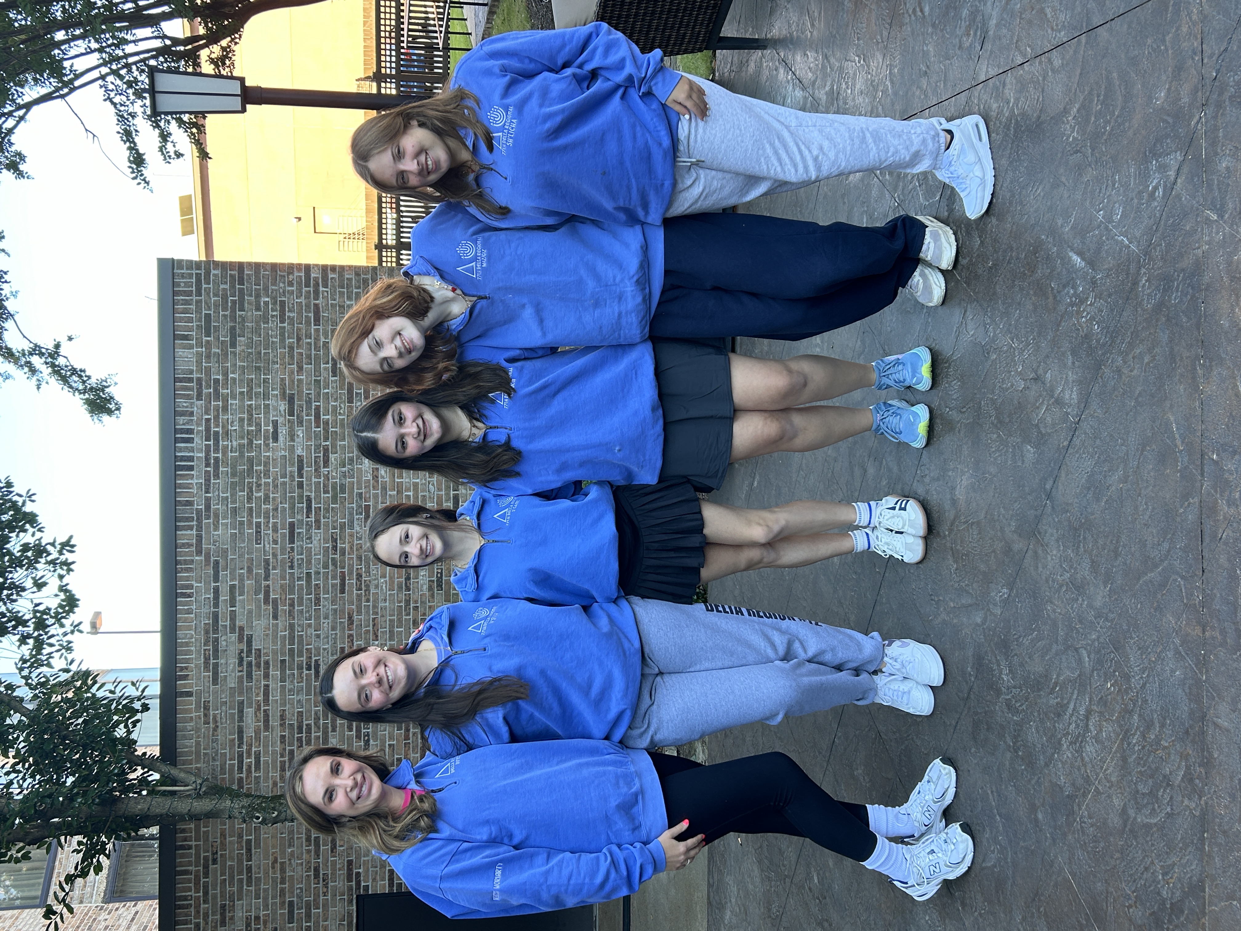 Group of people celebrating on stage