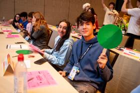 Group of people celebrating on stage
