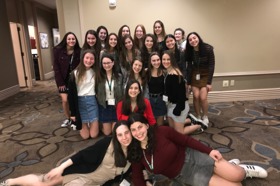 Group of people celebrating on stage