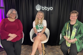 Group of people celebrating on stage