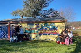 Group of people celebrating on stage