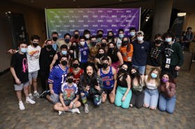 Group of people celebrating on stage