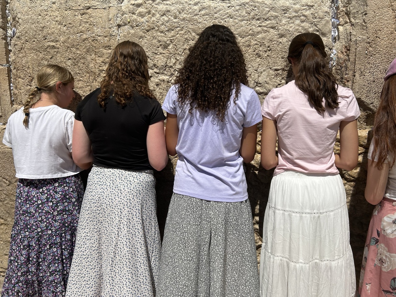 Group of people celebrating on stage