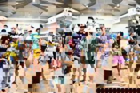 Group of people celebrating on stage