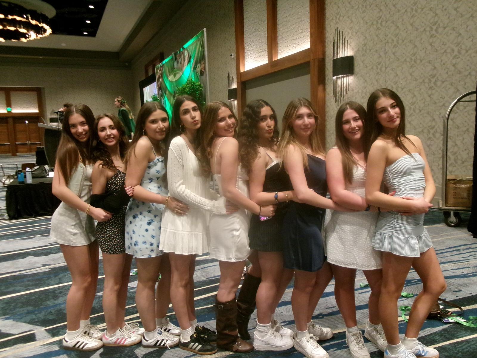 Group of people celebrating on stage