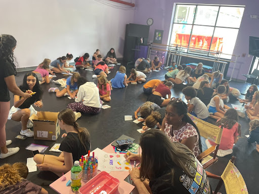 Group of people celebrating on stage