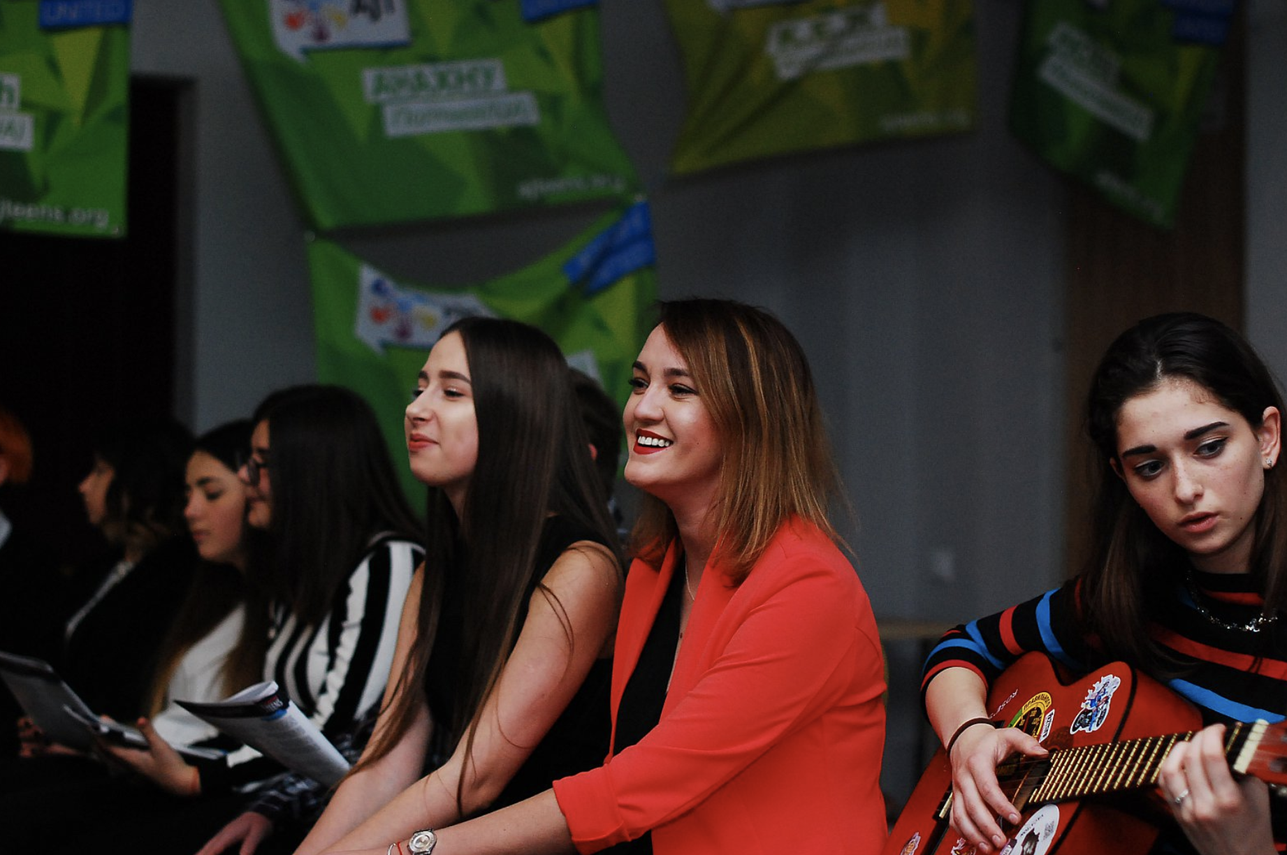 Group of people celebrating on stage