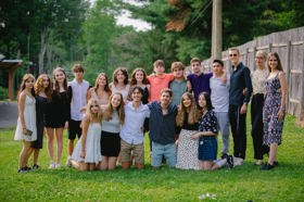 Group of people celebrating on stage