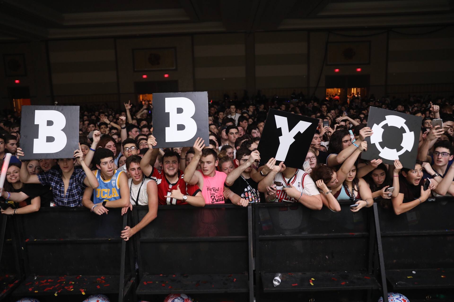 Group of people celebrating on stage