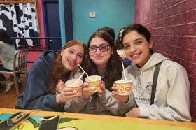 Group of people celebrating on stage