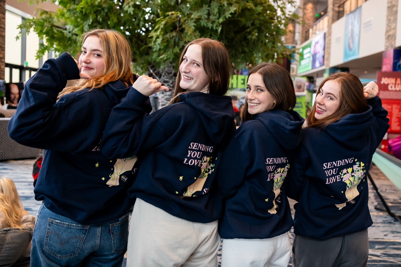 Group of people celebrating on stage