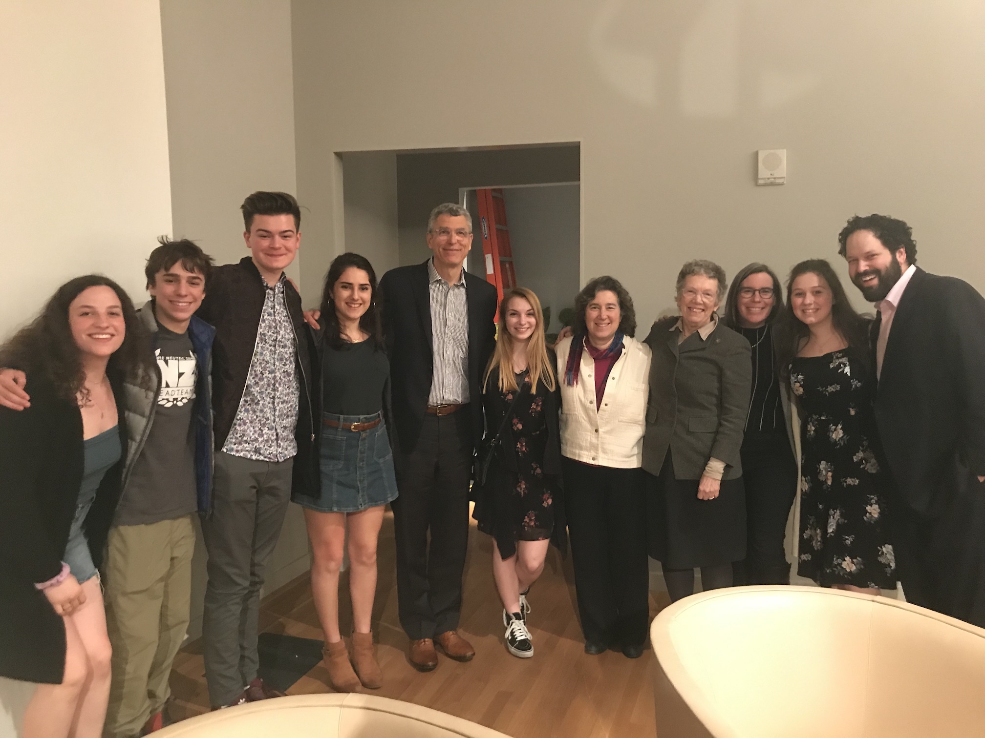 Group of people celebrating on stage