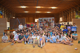Group of people celebrating on stage