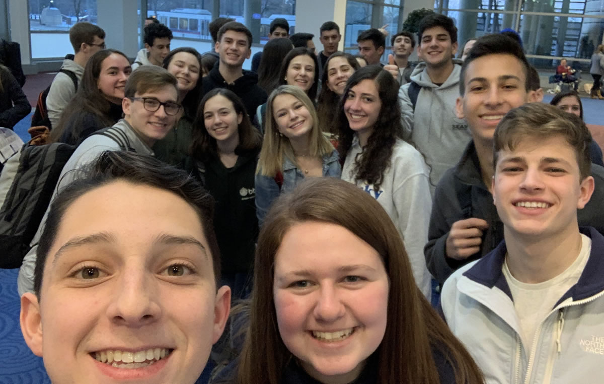 Group of people celebrating on stage