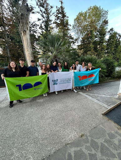 Group of people celebrating on stage