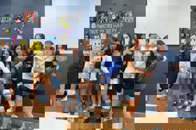 Group of people celebrating on stage