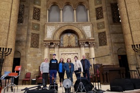 Group of people celebrating on stage