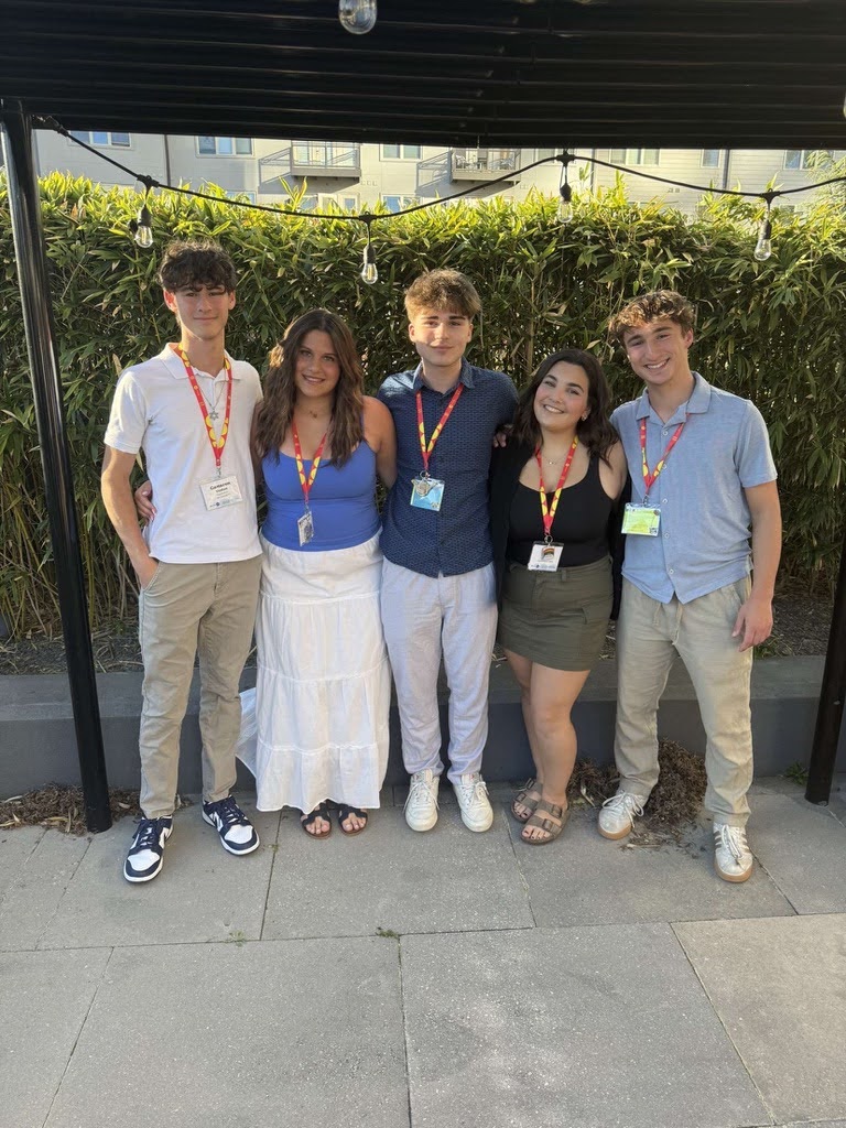 Group of people celebrating on stage