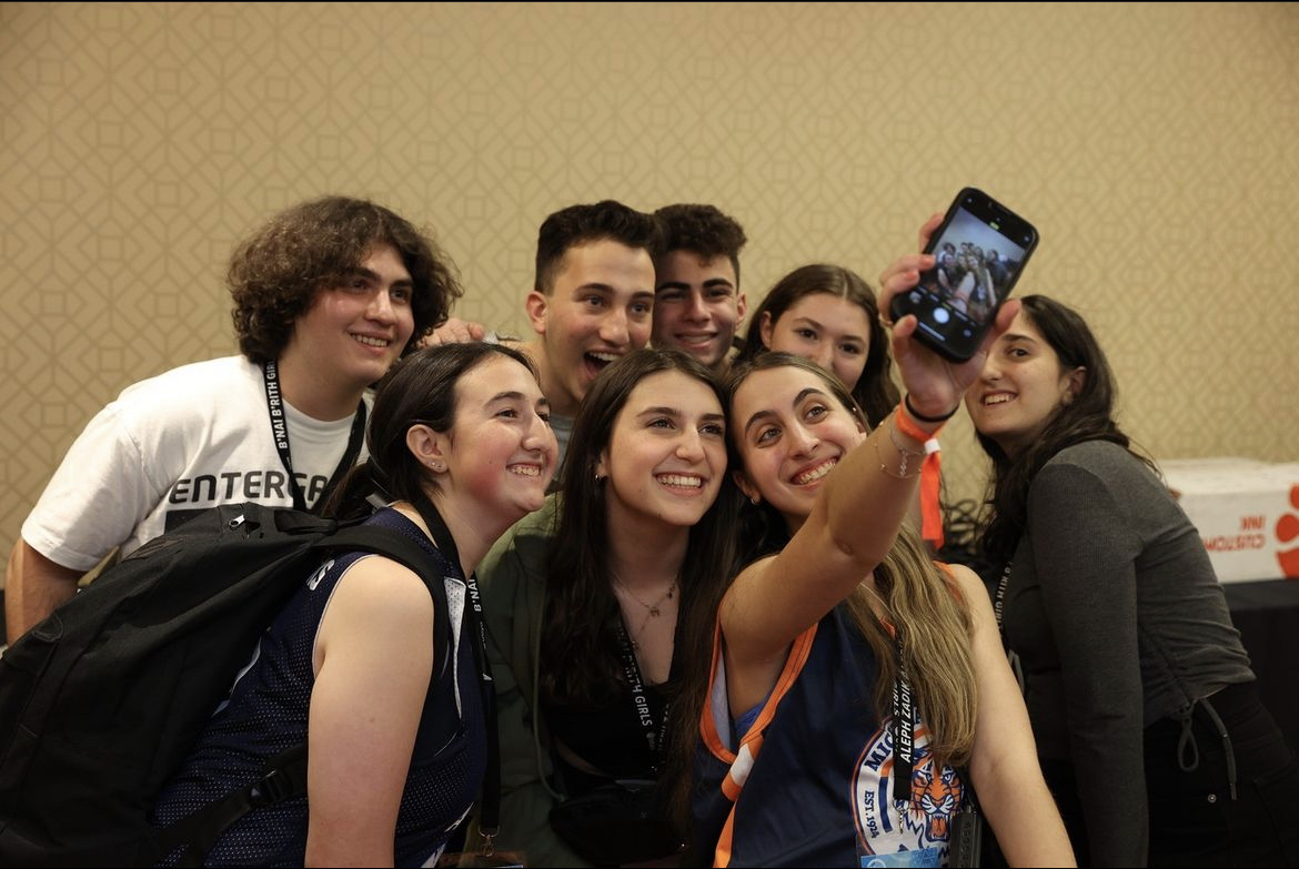 Group of people celebrating on stage