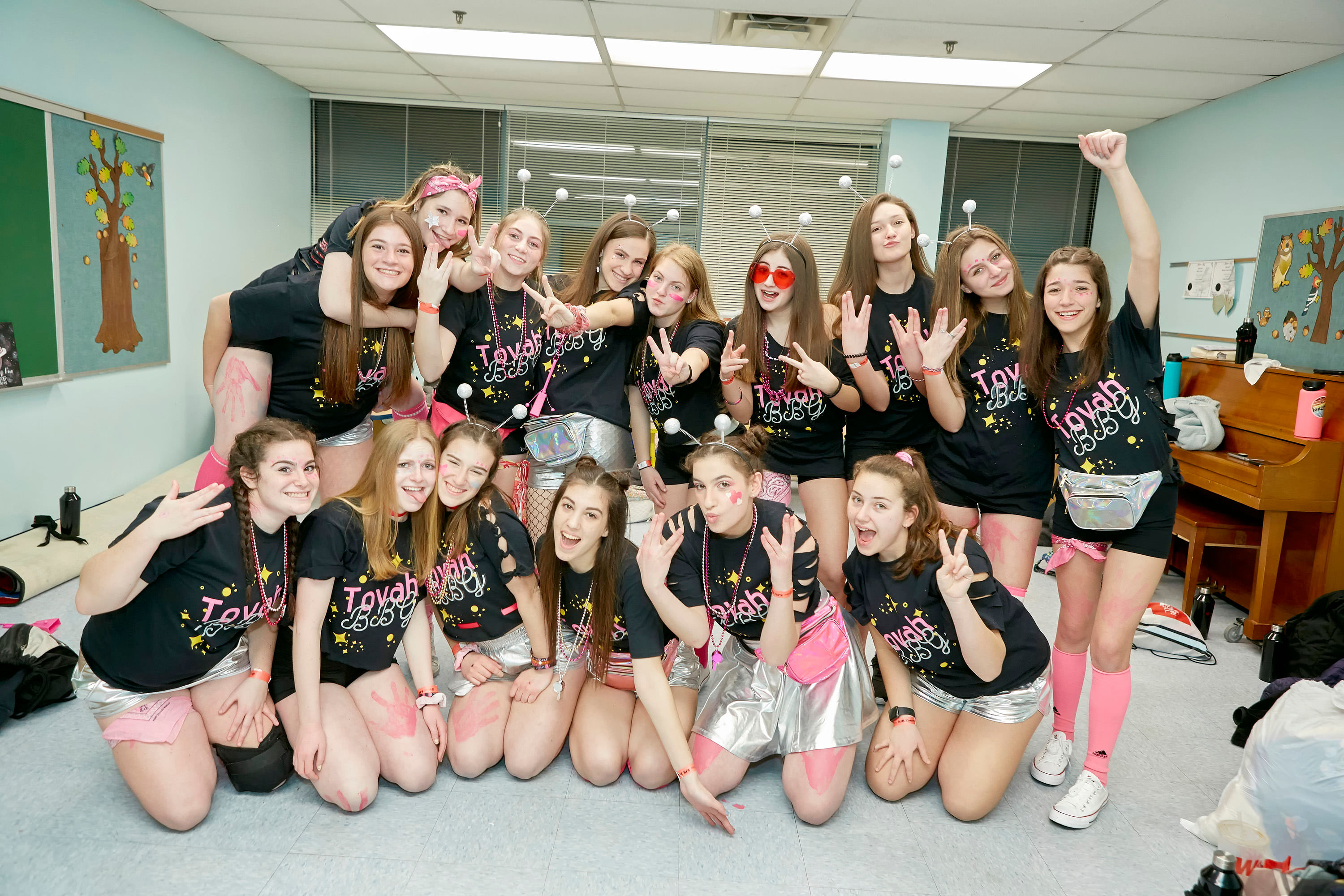 Group of people celebrating on stage